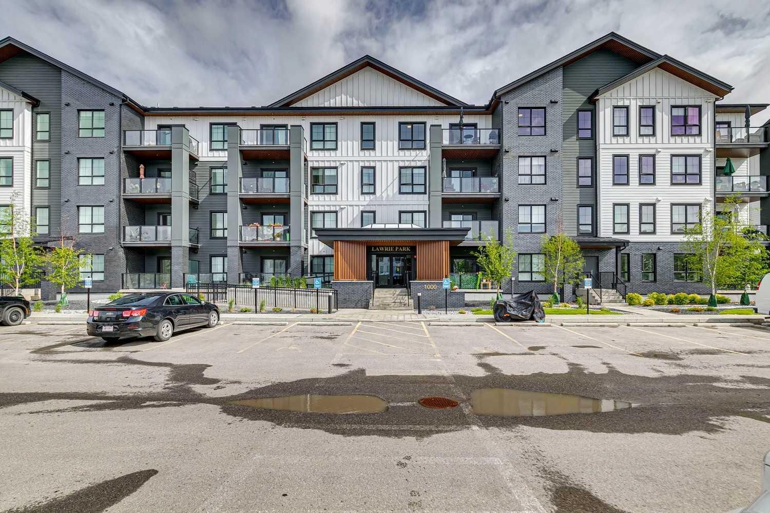 Property Photo: 100 Banister Drive 1401 AB T1S 5Y2