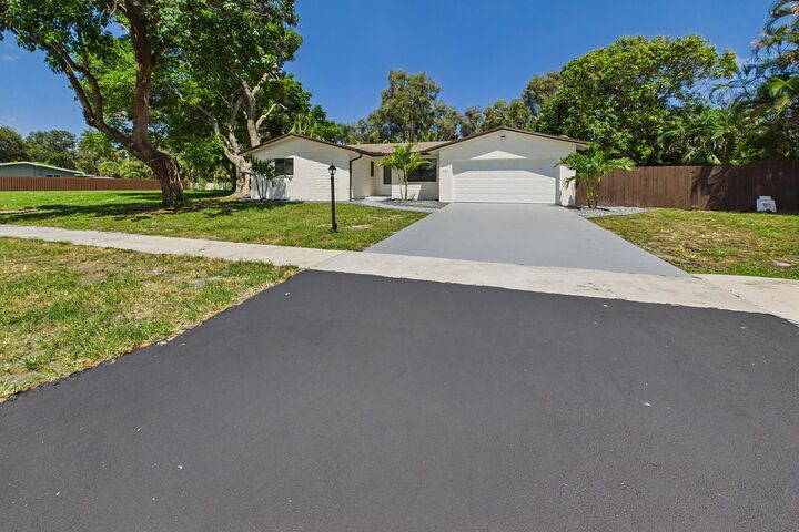 Property Photo:  520 NW 43rd Avenue  FL 33317 