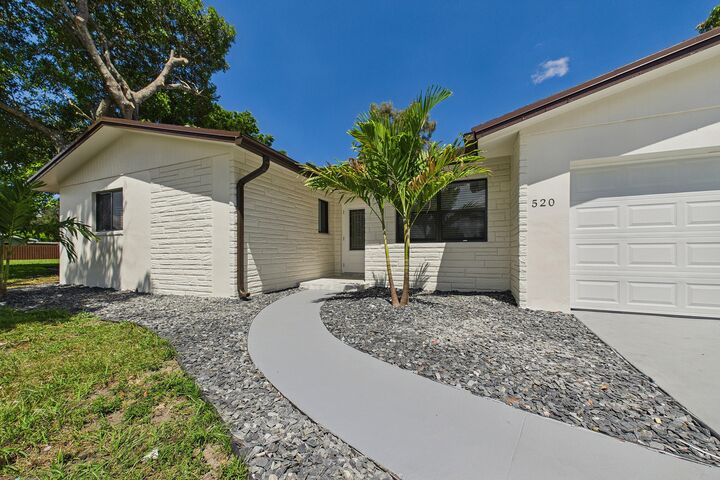 Property Photo:  520 NW 43rd Avenue  FL 33317 
