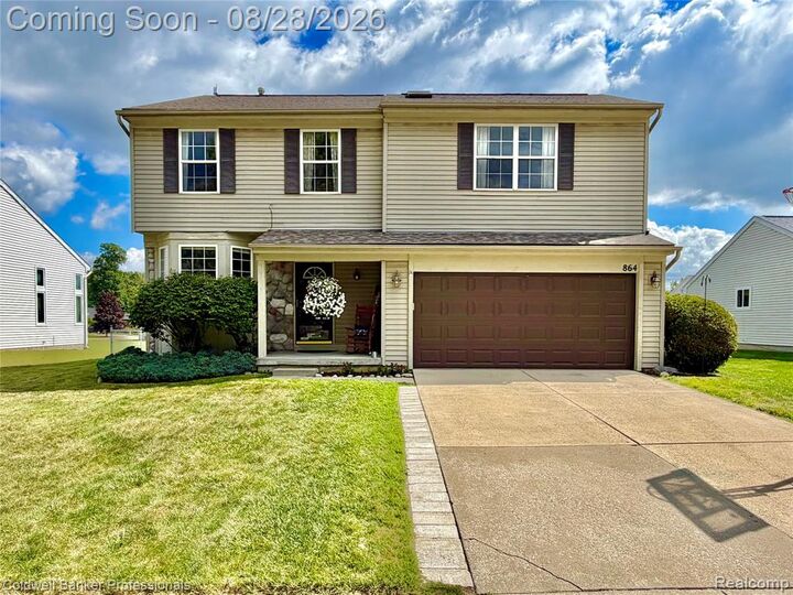 Property Photo:  864 Carriage Hill Drive  MI 48430 