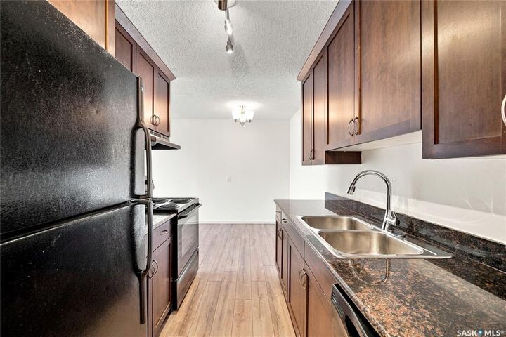 Property Photo:  2233 St Henry Avenue 410  SK S7M 5K9 