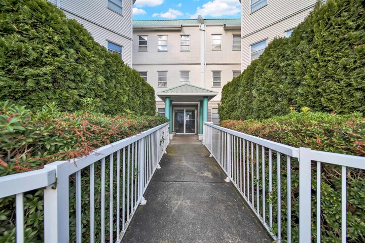 Property Photo:  9765 140 Street 102  BC V3T 5S5 