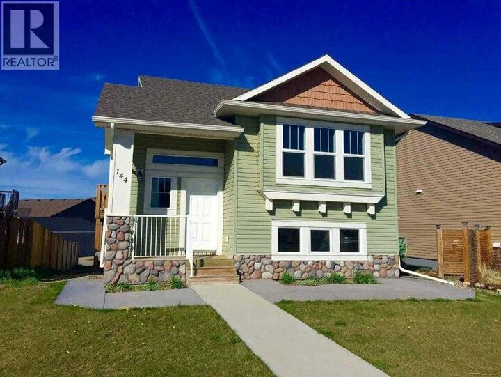 Property Photo: 144 Mt Sundial Court West AB T1J 5C3
