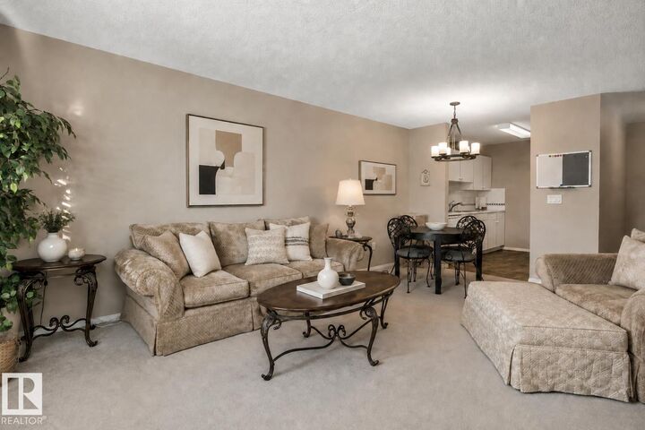 Property Photo:  11511 130 Street NW 115  AB T5M 4B3 