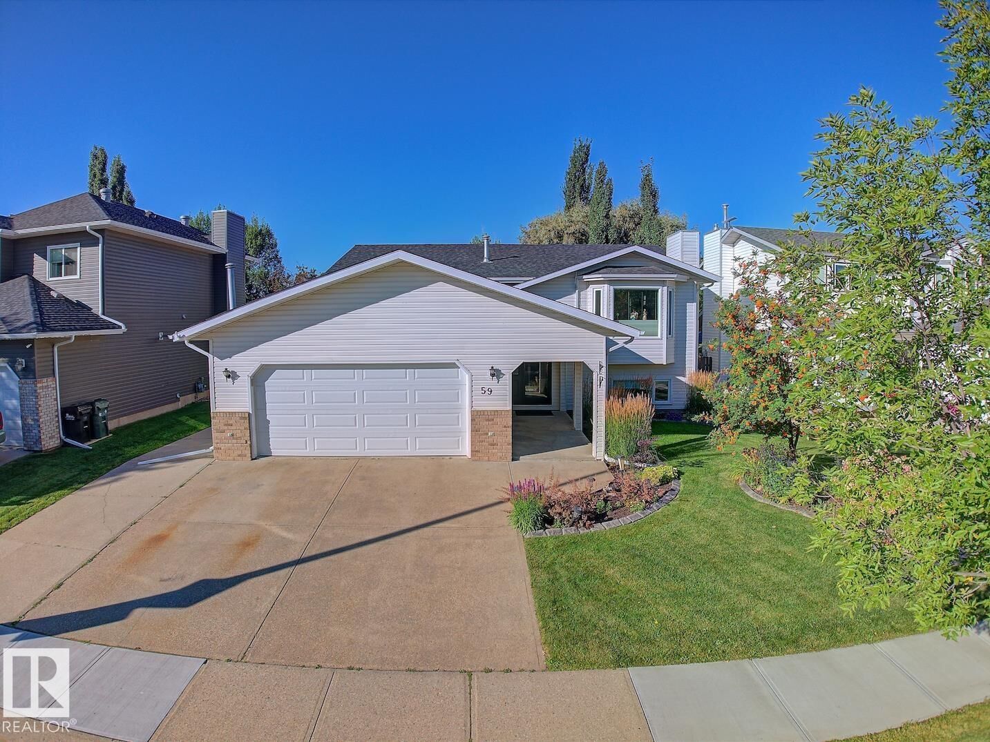 Property Photo:  59 Cimmaron Way  AB T8H 1N4 