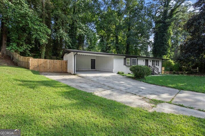 Property Photo:  4720 Shoshonee Trail  GA 30349 