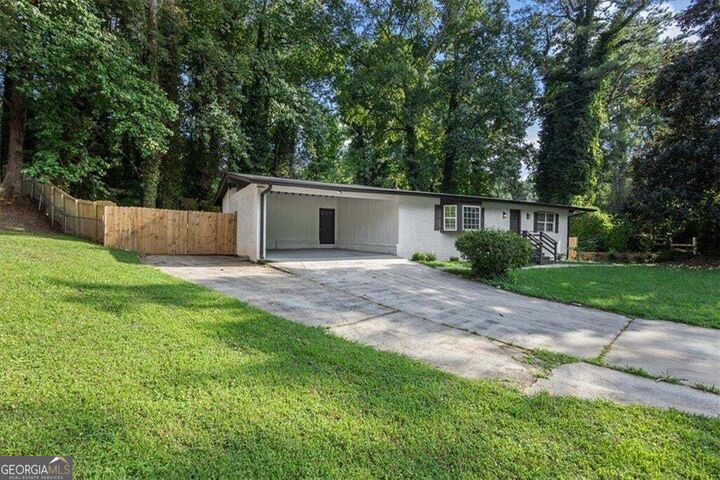 Property Photo:  4720 Shoshonee Trail  GA 30349 