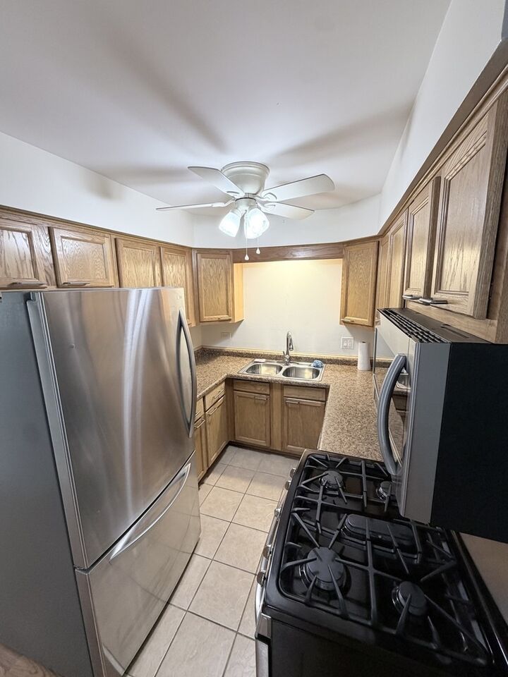 Property Photo: 7005 99th Street 2W IL 60415