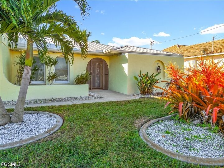 Property Photo:  144 SW 38th Terrace  FL 33914 
