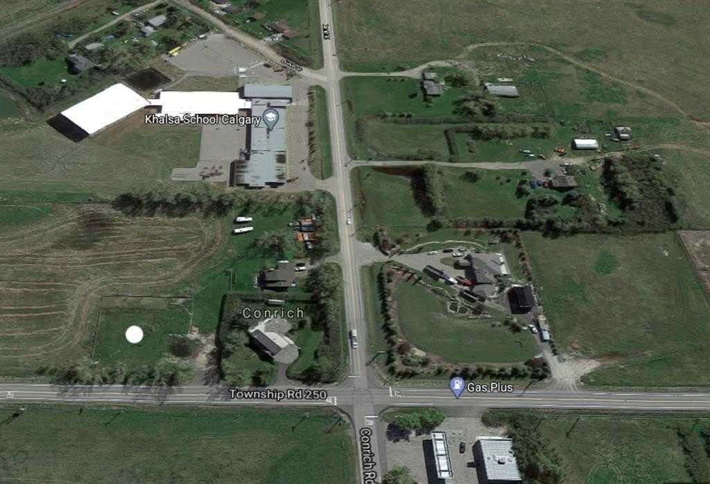 Property Photo:  283245 Township Road 250  AB T1Z 0P9 