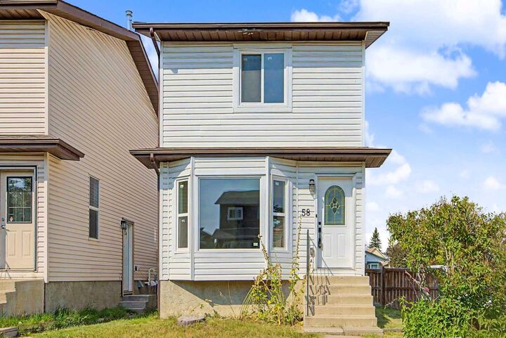 Property Photo: 58 Taraglen Road NE AB T3J 2N5