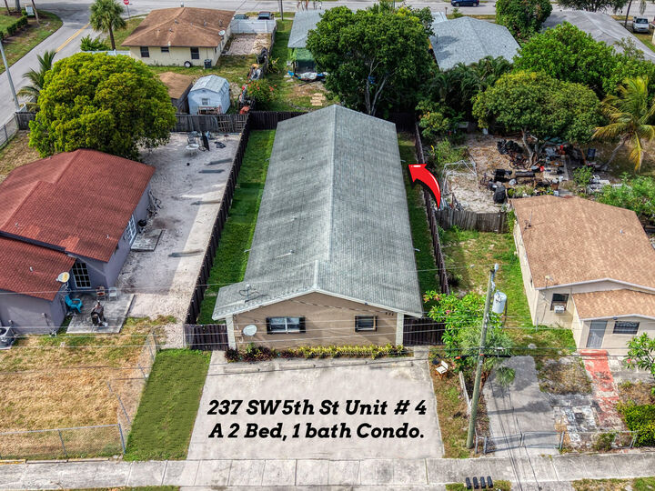 Property Photo:  237 SW 5th Street 4D  FL 33441 