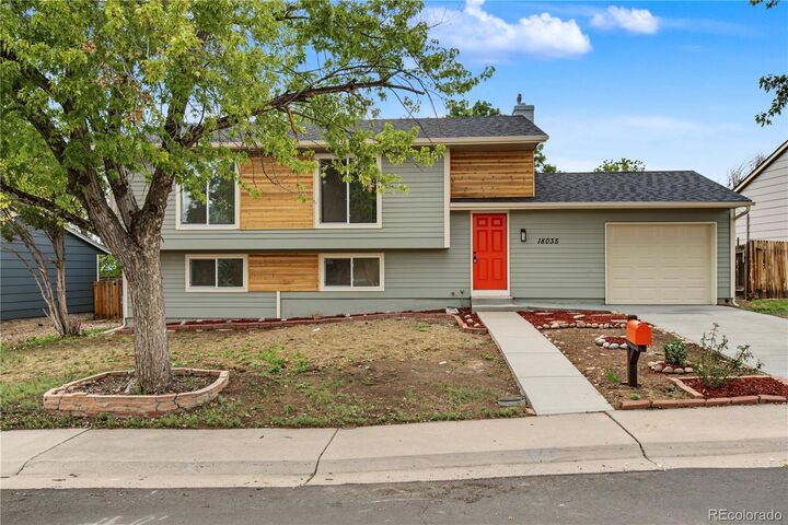 Property Photo: 18035 E Iowa Drive CO 80017