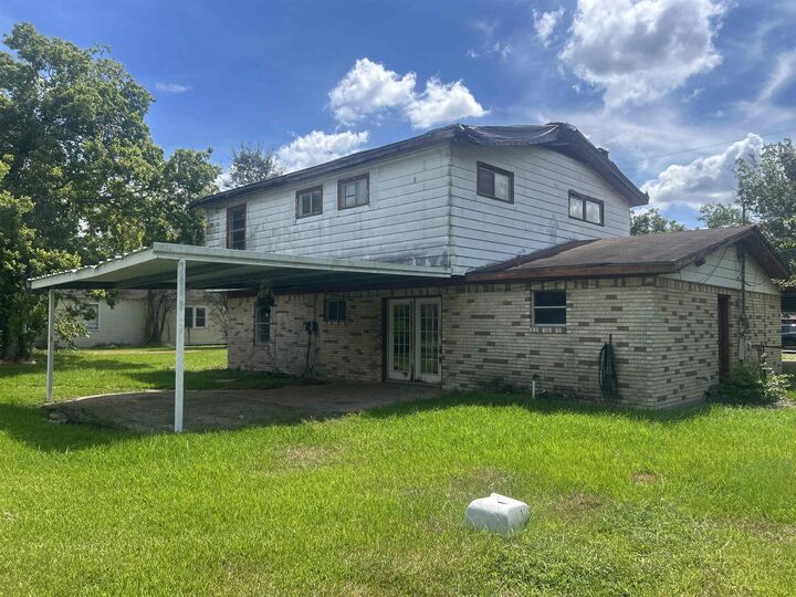 Property Photo:  1412 Missouri St  TX 77630 