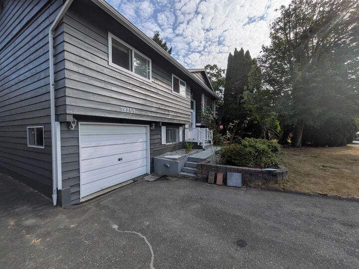 Property Photo:  19751 54A Avenue  BC V3A 3W4 