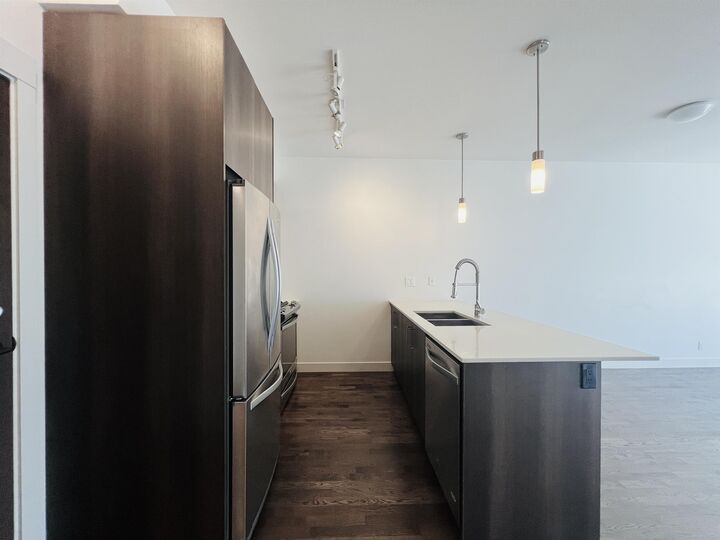 Property Photo:  7058 14th Avenue 416  BC V3N 0E6 