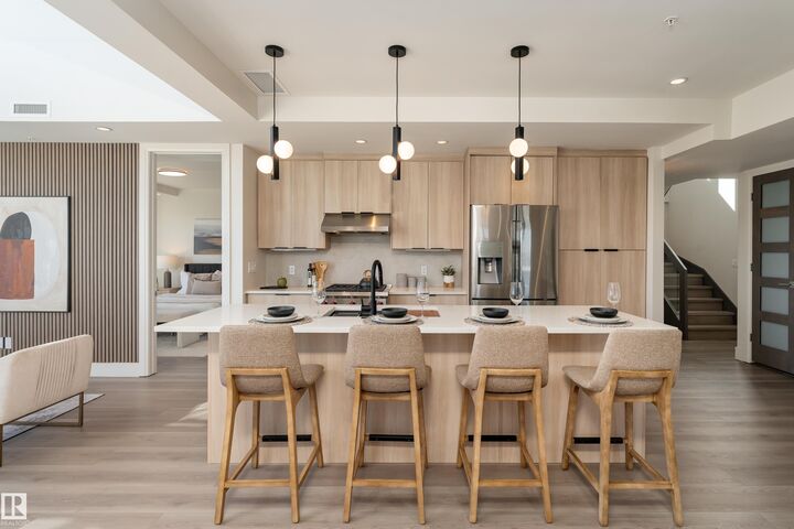 Property Photo:  1350 Windermere Way SW 401  AB T6W 2J3 