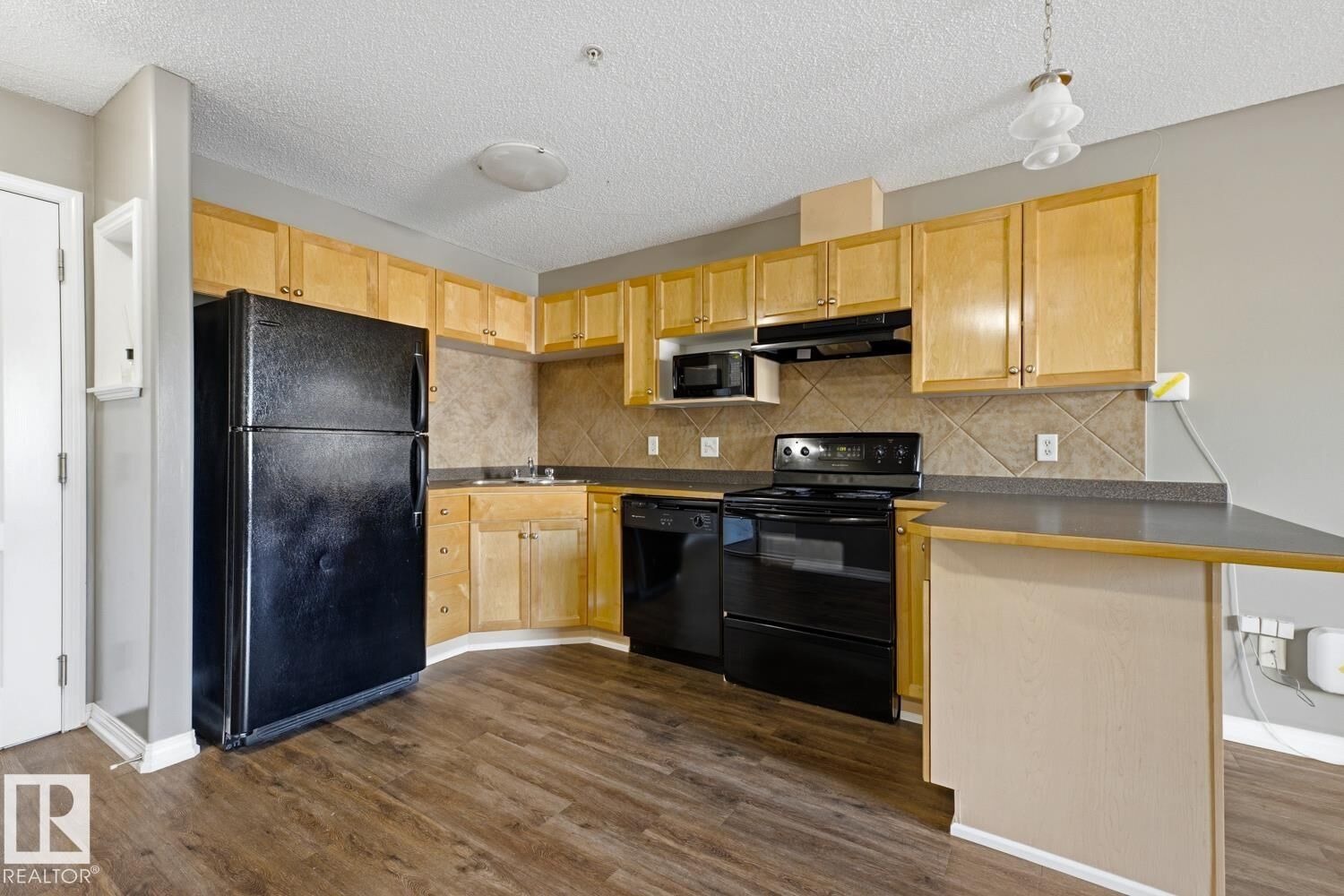 Property Photo:  7511 171 Street NW 101  AB T5T 6S7 