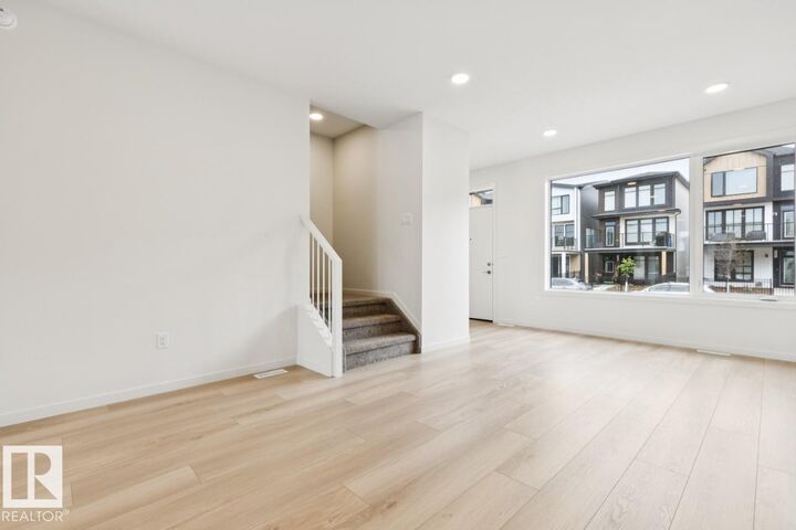 Property Photo:  8148 228 Street NW  AB T5T 7X9 