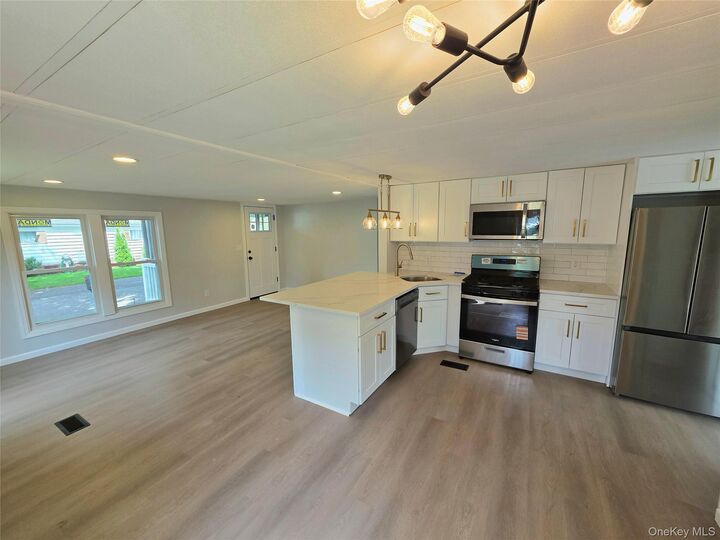 Property Photo:  525 Riverleigh Avenue 221  NY 11901 