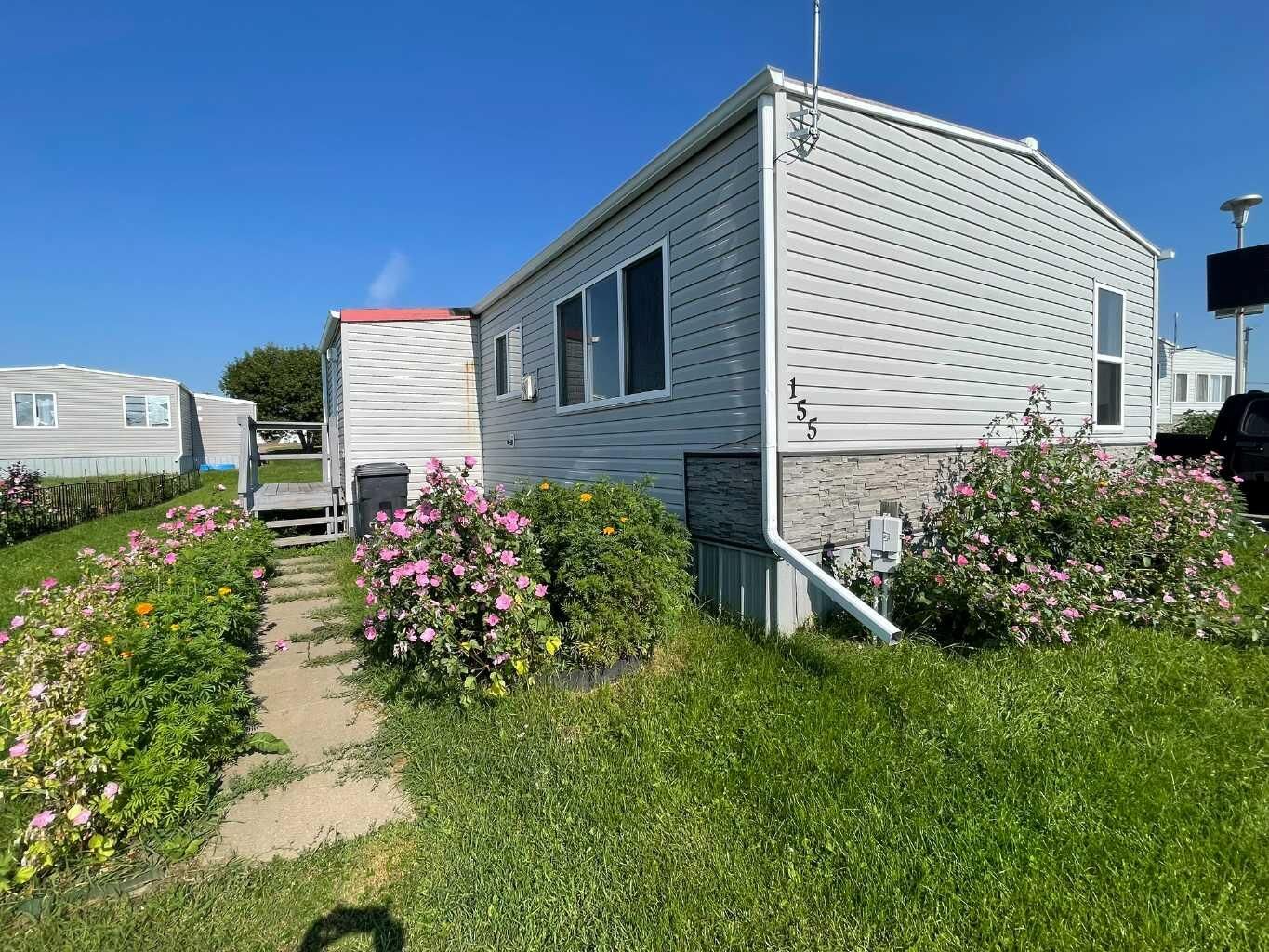 Property Photo: 5308 57 Street 155 AB T9V 2A3