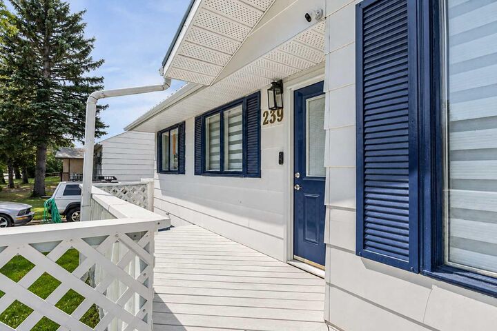 Property Photo:  239 2 Street E  AB T1R 0G8 