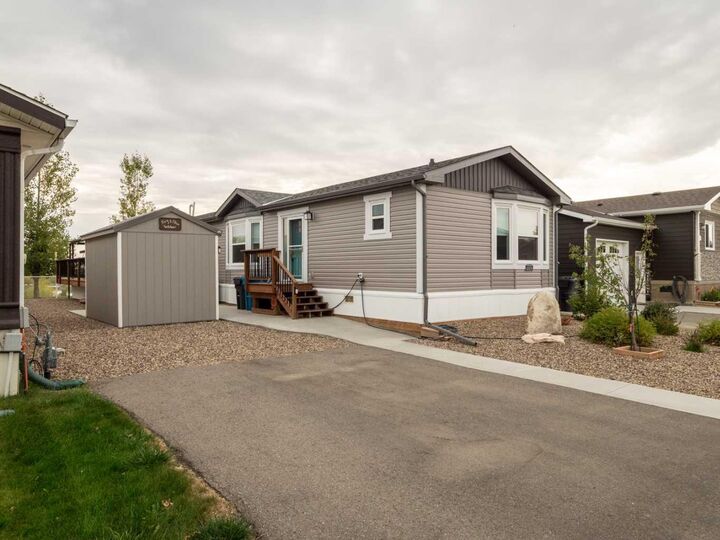 Property Photo:  1003 Summer Street  AB T1M 0C6 