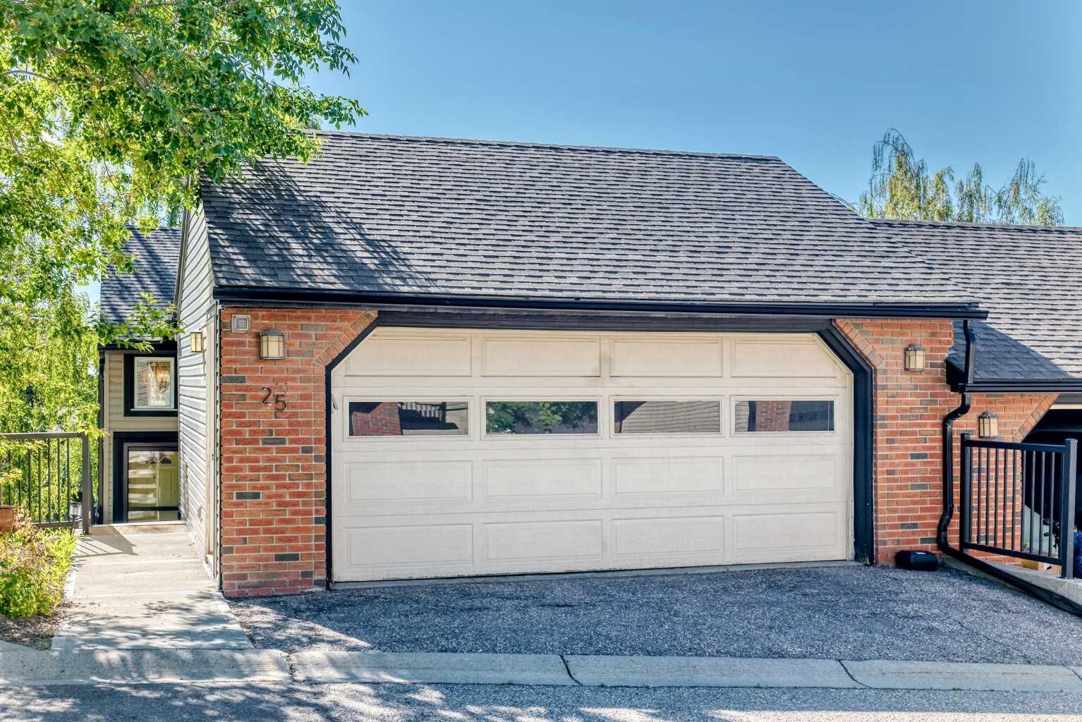 Property Photo:  448 Strathcona Drive SW 25  AB T3H 1M3 