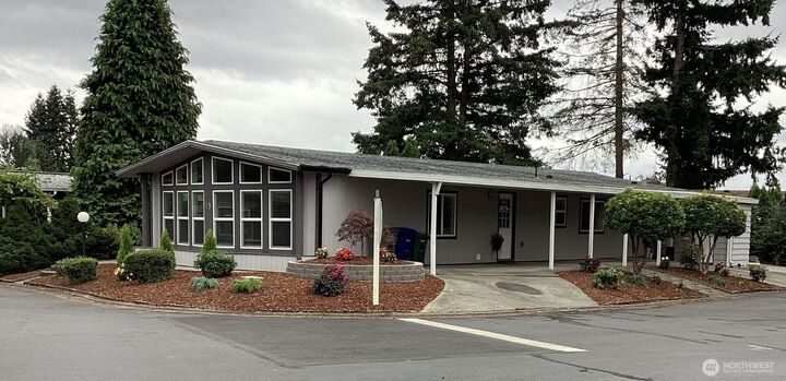 Property Photo:  201  Union Avenue SE 13  WA 98059 