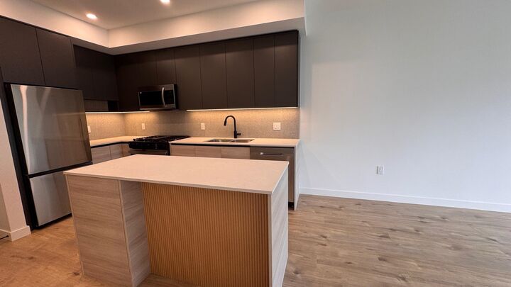 Property Photo:  9xxx University Crescent 3xx  BC V5A 0H5 