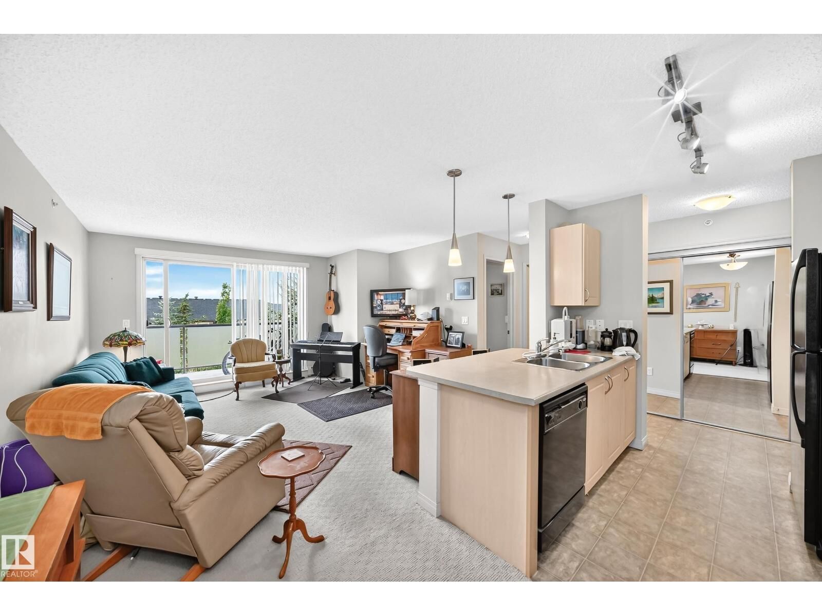 Property Photo:  #418 13907 136 St NW  AB T6V 1Y5 