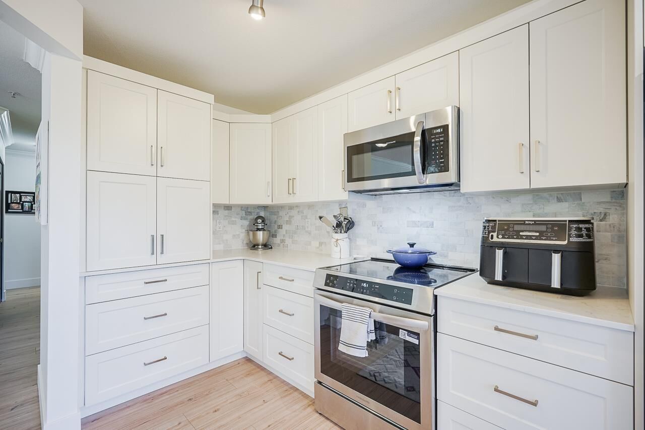 Property Photo:  32075 George Ferguson Way 208  BC V2T 2K7 