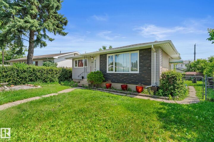 Property Photo: 13131 60 Street NW AB T5A 0S2