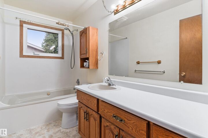 Property Photo:  8827 138 Avenue NW  AB T5E 2A7 
