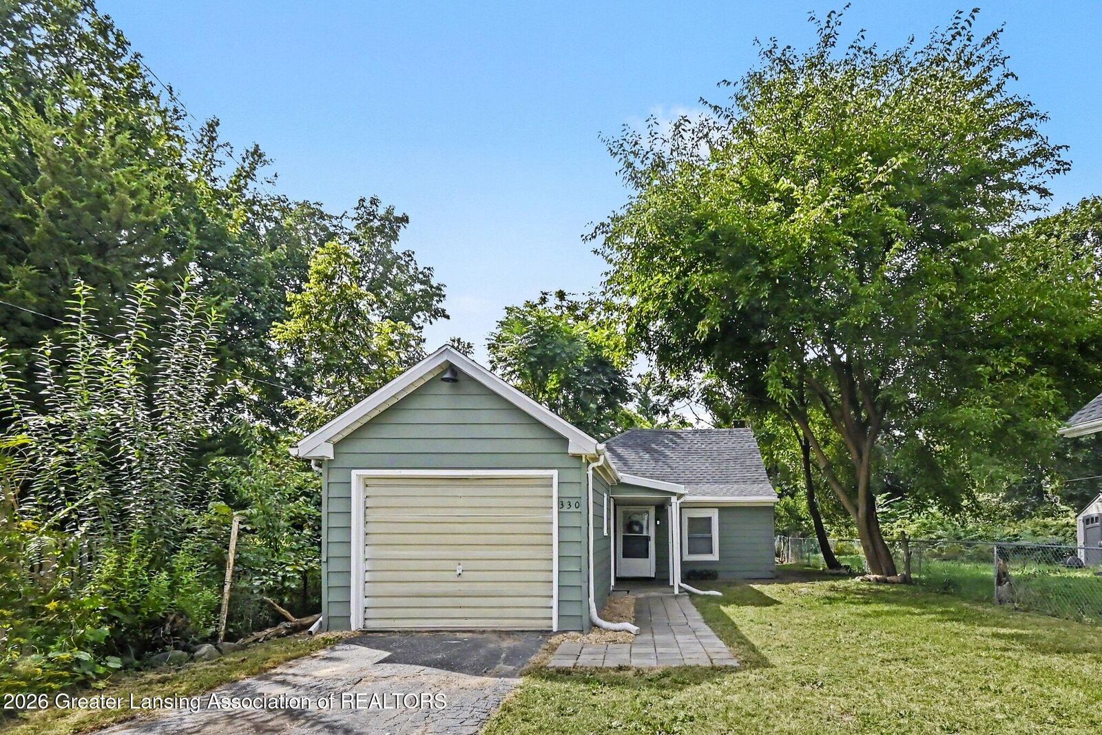 Property Photo:  330 S Rosemary Avenue  MI 48917 