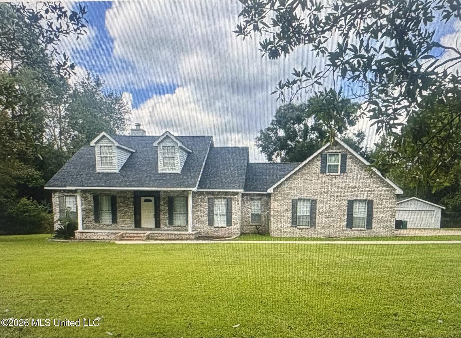 Property Photo: 14081 Woodland Hills Drive MS 39532