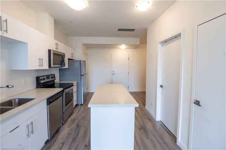 Property Photo: 690 King Street W 521 ON N2H 5L8