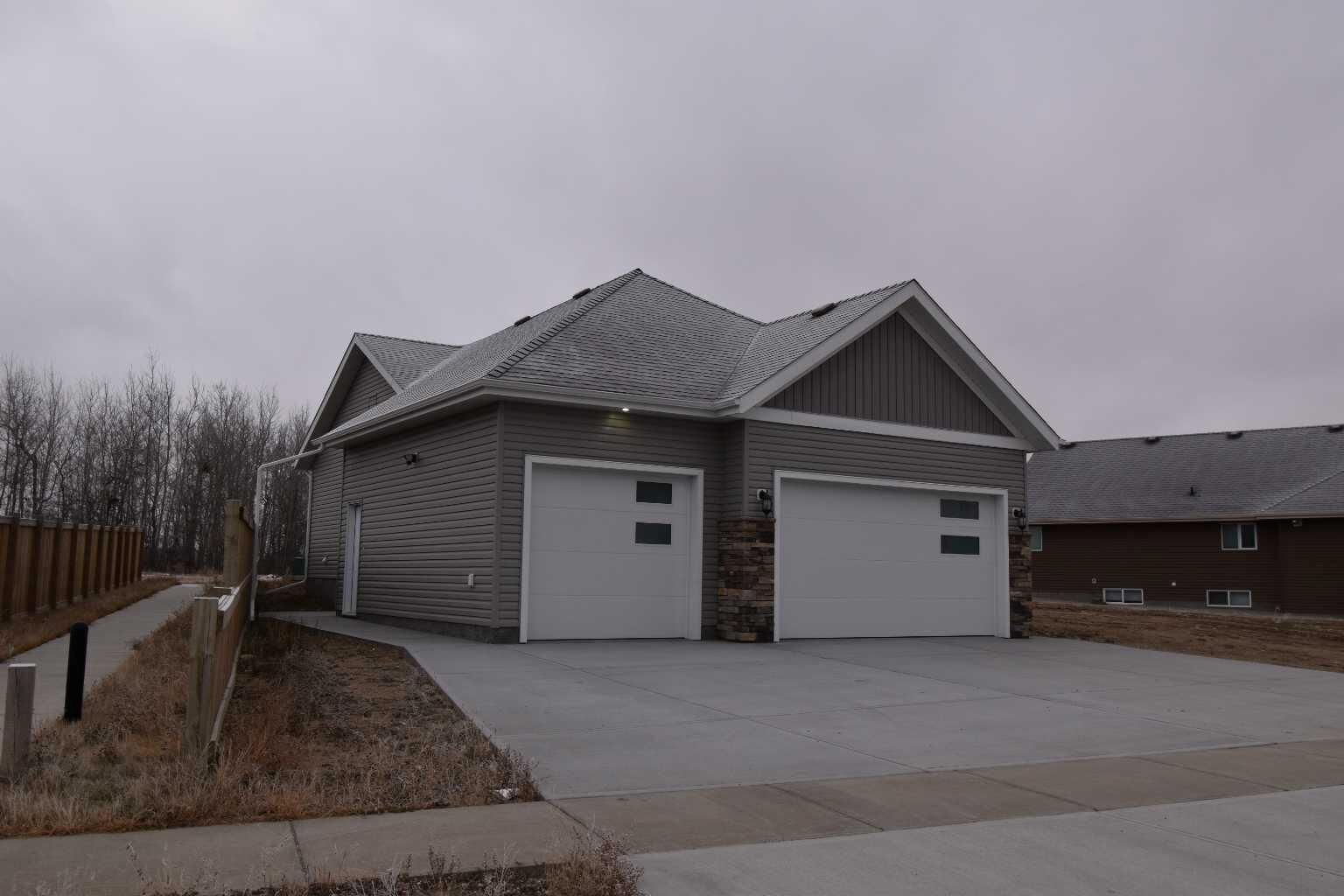 Property Photo:  2005B 61 Avenue  AB T9V 3R2 