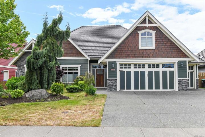 Property Photo:  1477 Crown Isle Dr  BC V9N 3Z5 
