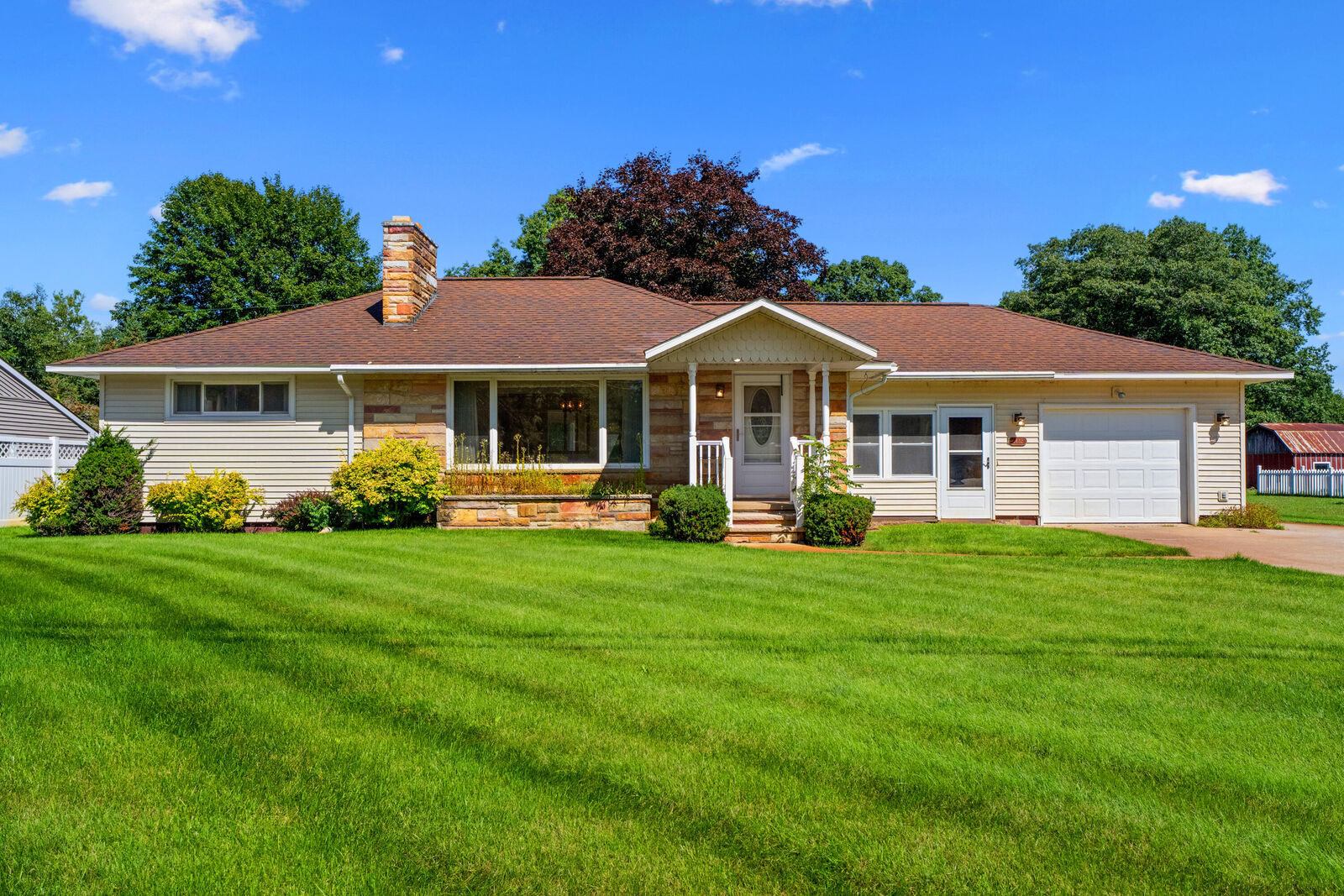 Property Photo:  1432 Long Rapids Road  MI 49707 