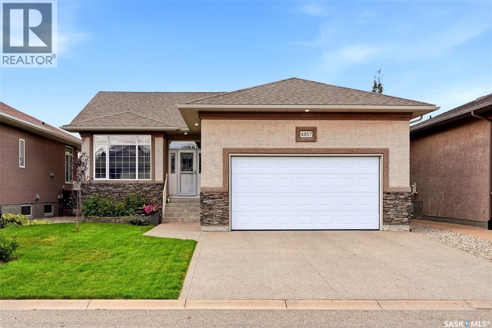 Property Photo: 4857 McCombie Crescent SK S4W 0B2