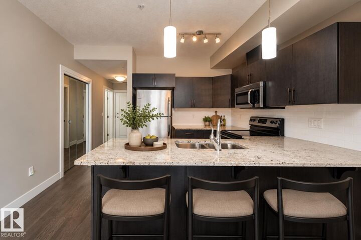 Property Photo:  #311 5001 Eton Boulevard  AB T8H 0N7 