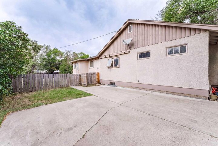Property Photo:  5220 53 Street  AB T1G 1M4 