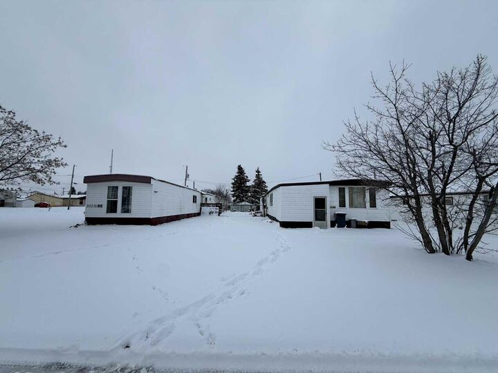 Property Photo:  5107, 5113, 5117 51 Avenue  AB T0H 0E0 