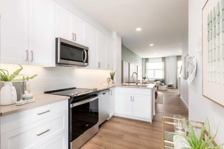 Property Photo: 272 Heirloom Crescent SE 106 AB T3S 1H2