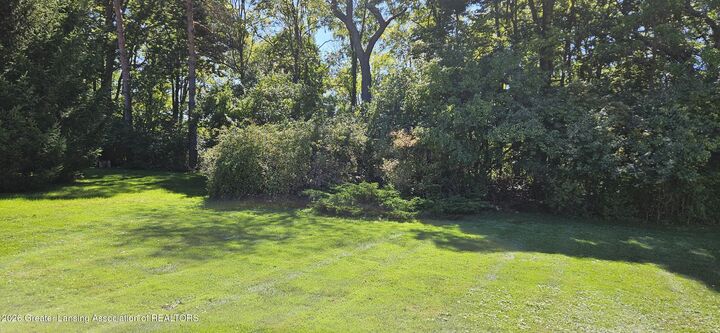 Property Photo:  1775 Mirabeau Drive  MI 48864 