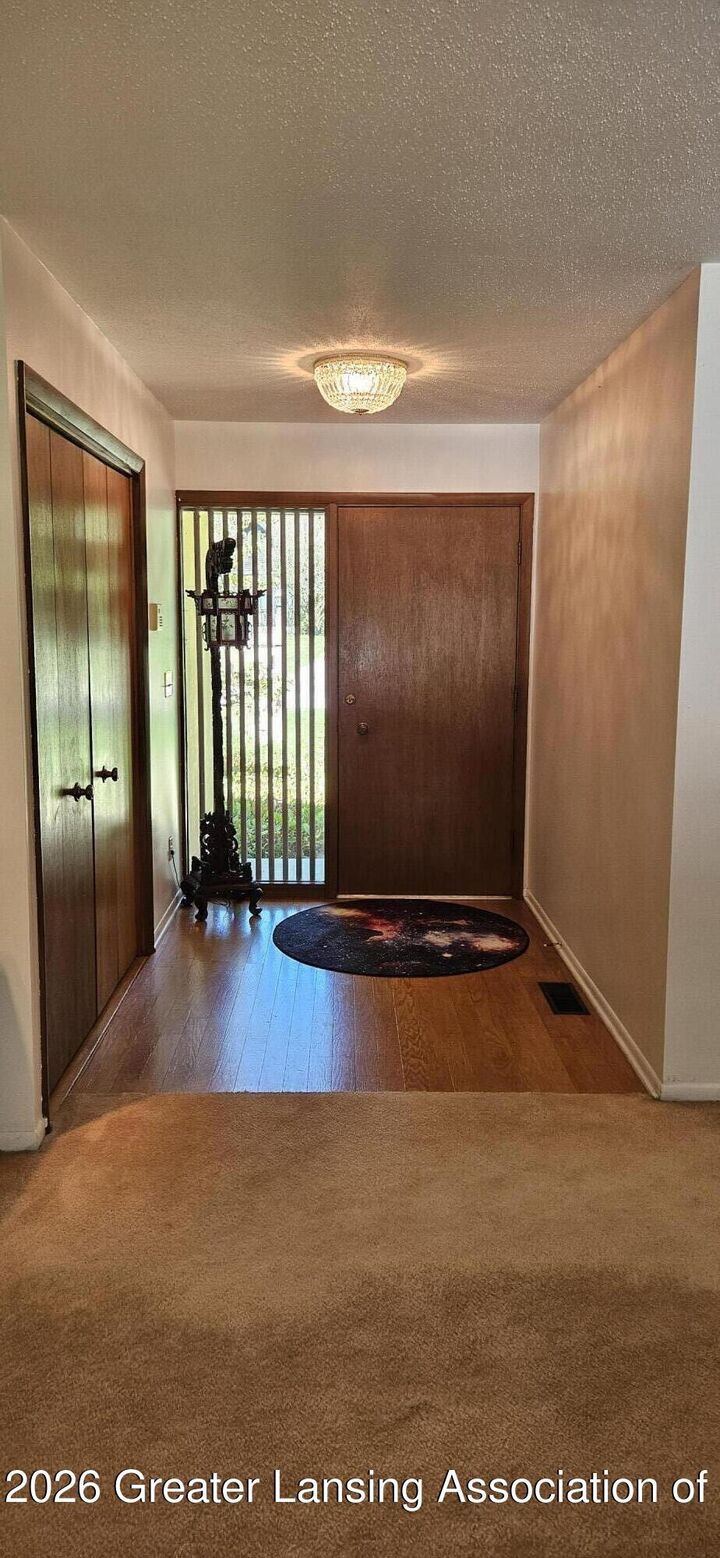 Property Photo: 1775 Mirabeau Drive MI 48864