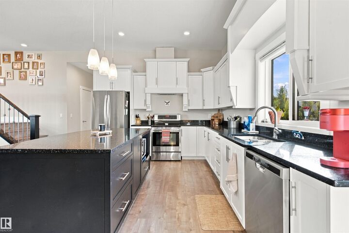 Property Photo:  6730 Tri City Way  AB T9M 0L2 