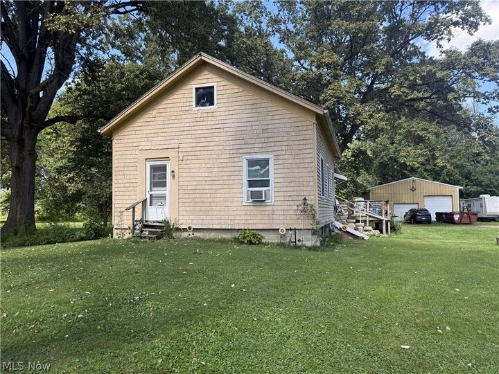 Property Photo:  6887 Tallmadge Road  OH 44272 