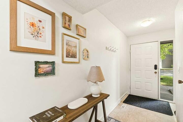 Property Photo:  23 Glamis Drive SW 80  AB T3E 6S3 